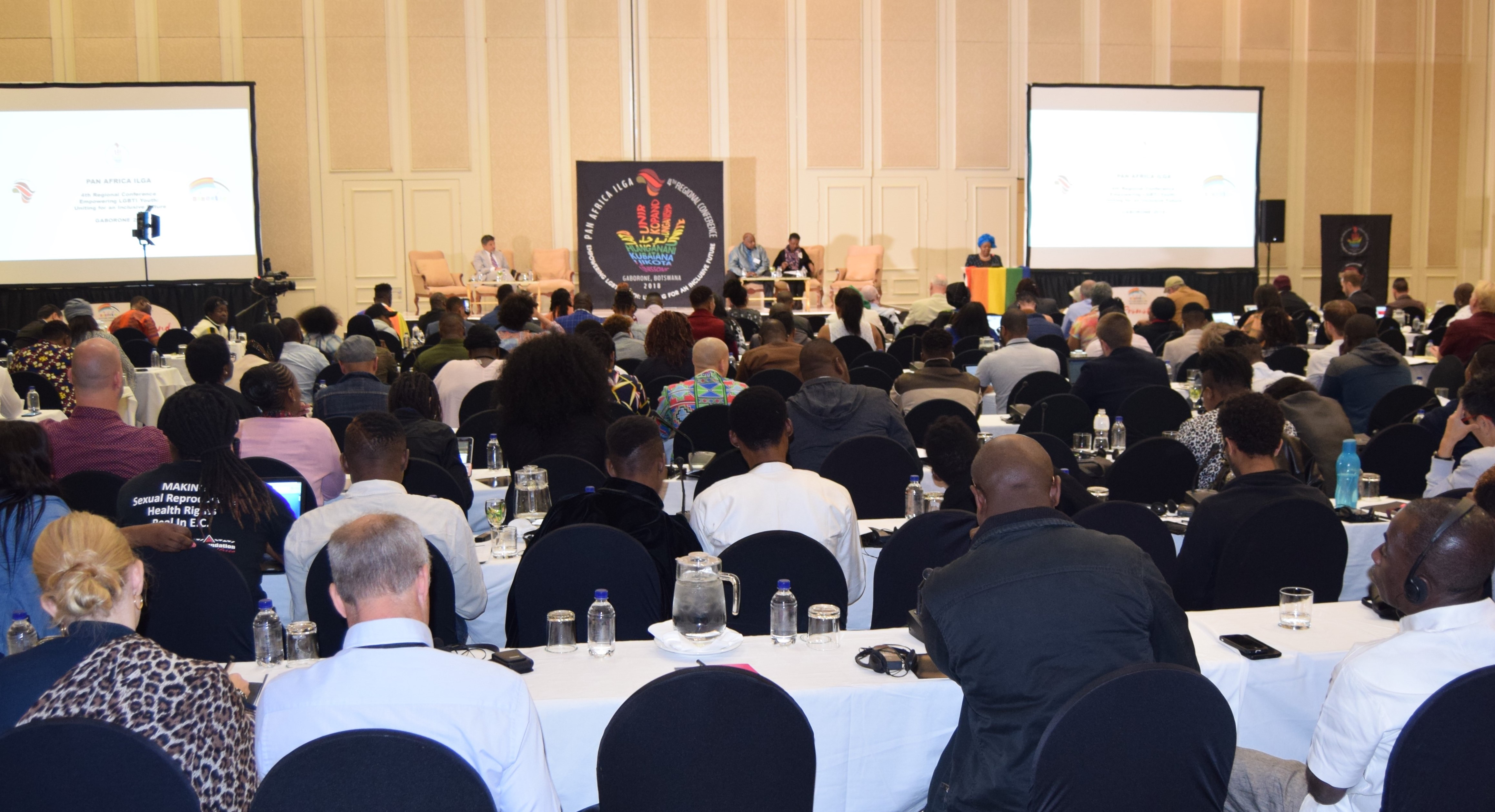 Full conference hall packed with delegates